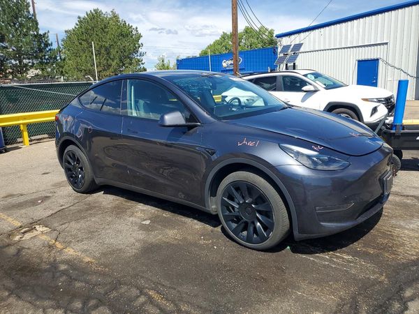 2024 TESLA MODEL Y — Passenger 3/4
