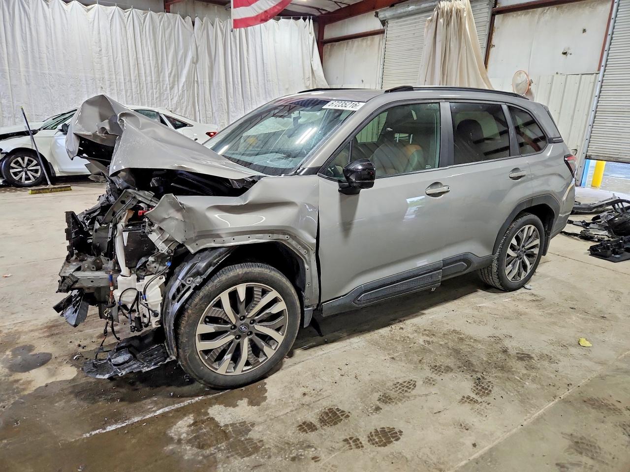 2025 SUBARU FORESTER Touring — Front 3/4