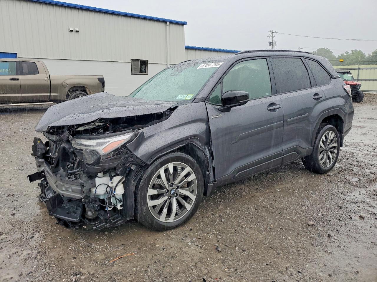 2025 SUBARU FORESTER Touring — Front 3/4
