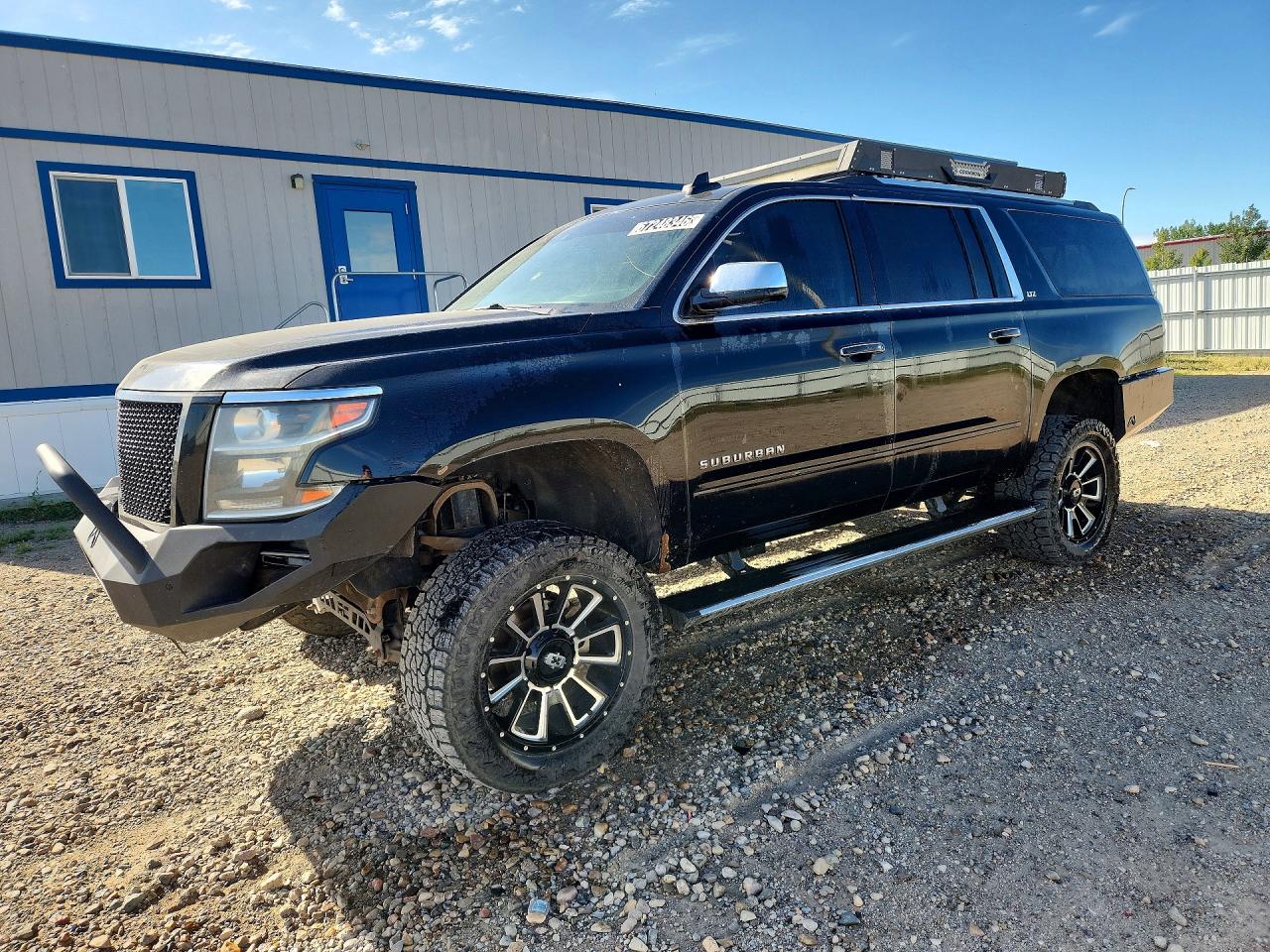 2015 CHEVROLET SUBURBAN LTZ — Front 3/4