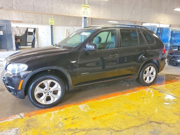 2012 BMW X5 xDrive50i — Front 3/4