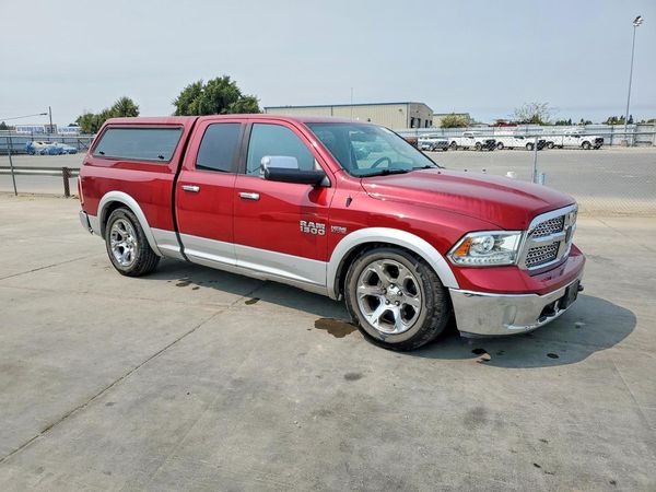 2014 RAM 1500 Laramie — Passenger 3/4