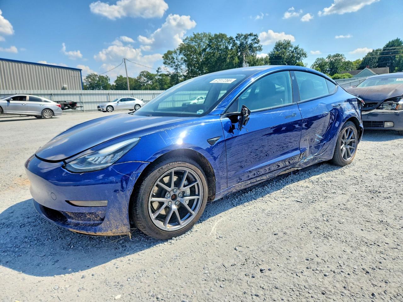 2021 TESLA MODEL 3 — Front 3/4