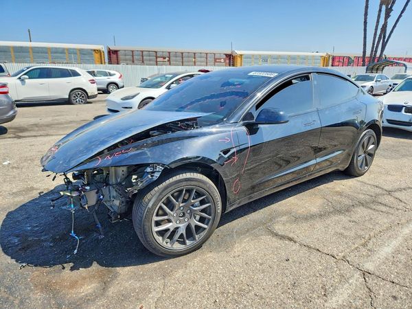 2026 TESLA MODEL 3 — Front 3/4