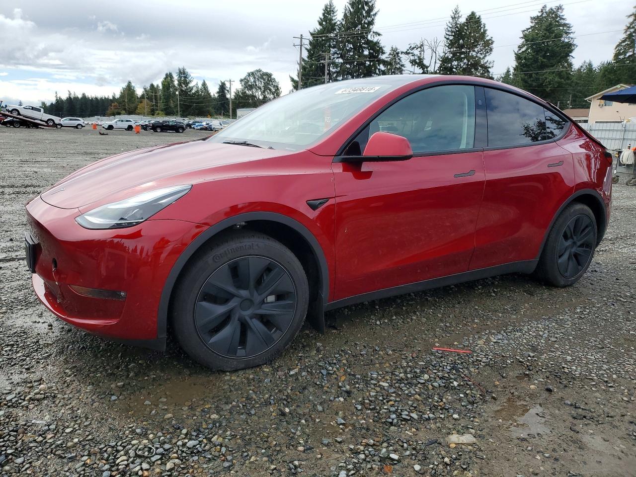 2025 TESLA MODEL Y — Front 3/4