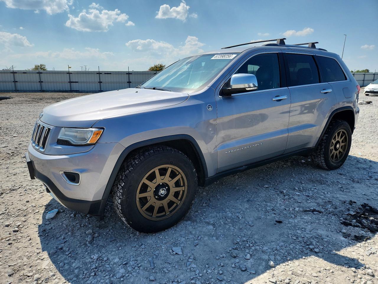 2015 JEEP GRAND CHEROKEE Limited — Front 3/4