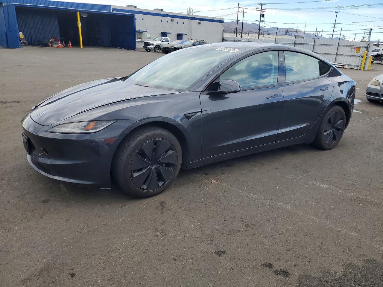 2024 TESLA MODEL 3 — Front 3/4