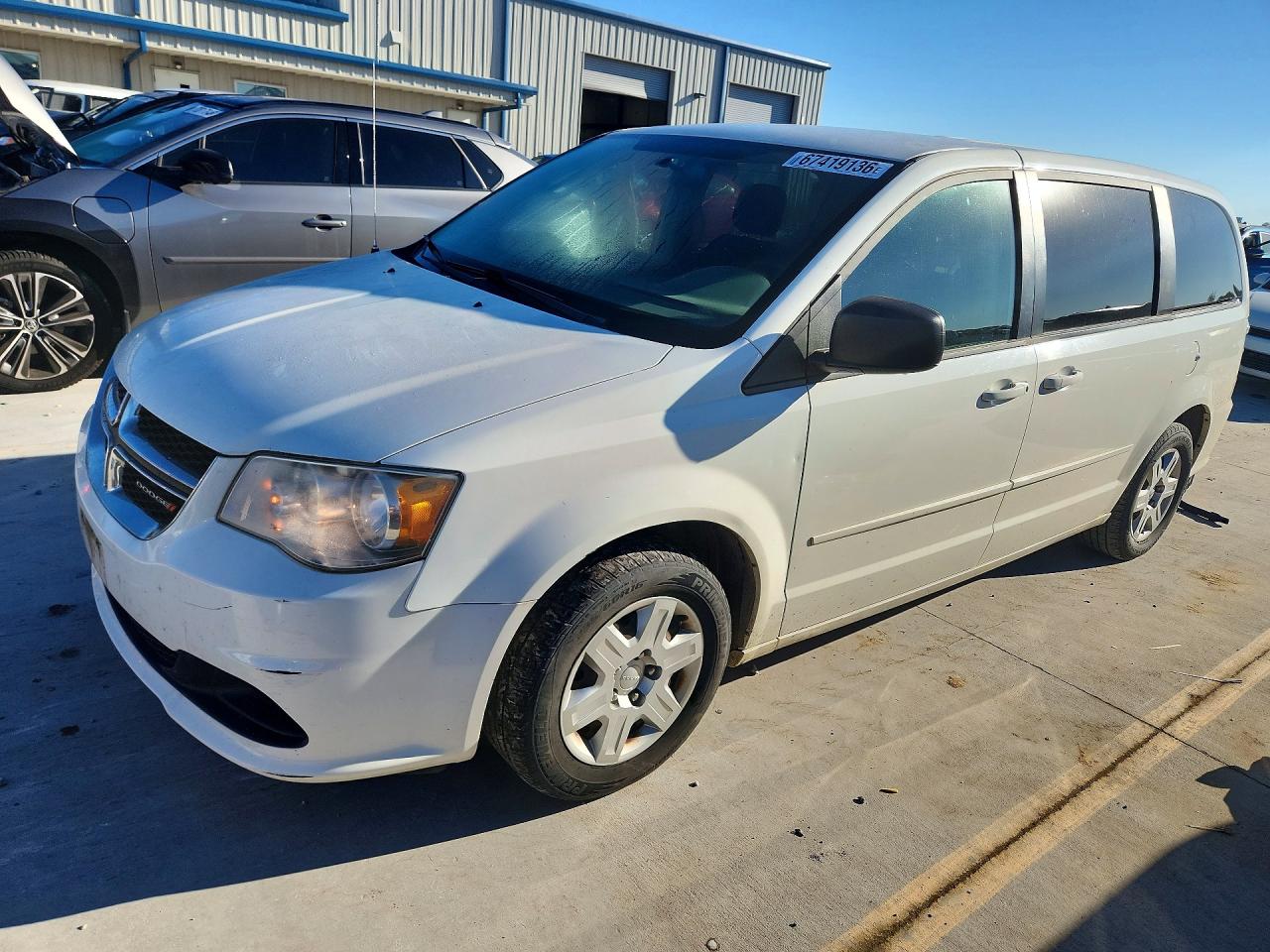 2012 DODGE GRAND CARAVAN SE — Front 3/4