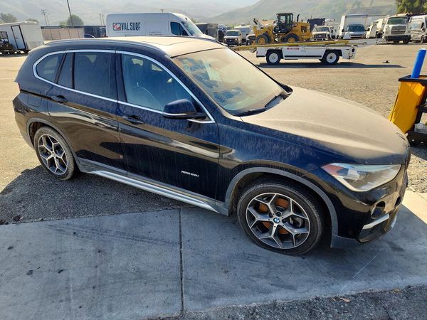 2016 BMW X1 xDrive28i — Passenger 3/4