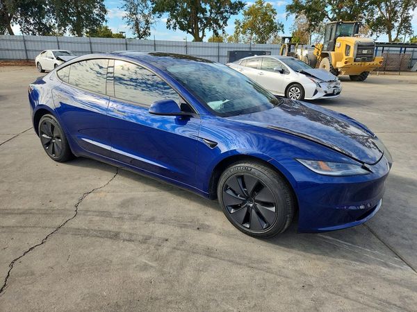2025 TESLA MODEL 3 — Passenger 3/4