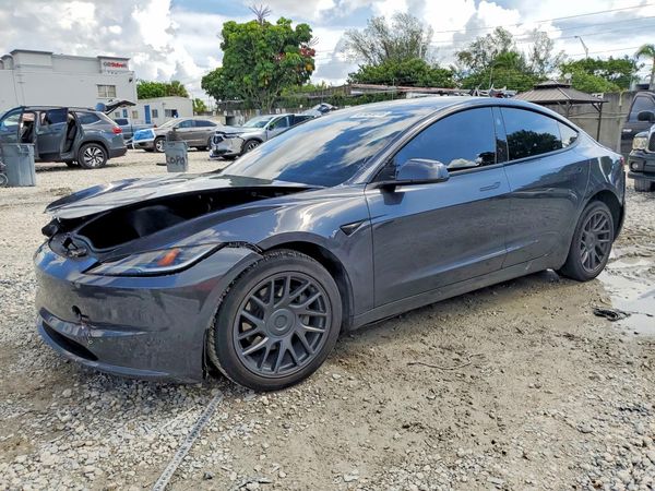 2025 TESLA MODEL 3 — Front 3/4