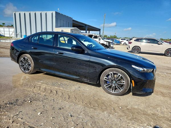 2026 BMW 530 xDrive — Passenger 3/4