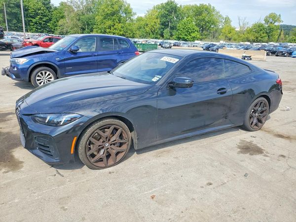2025 BMW 4 SERIES xDrive — Front 3/4