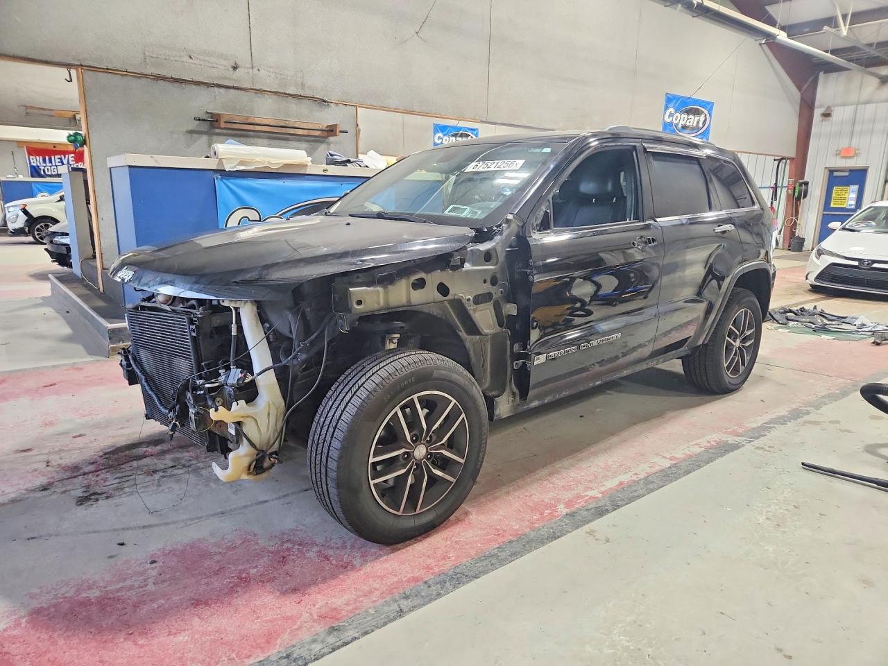 2017 JEEP GRAND CHEROKEE Limited — Front 3/4