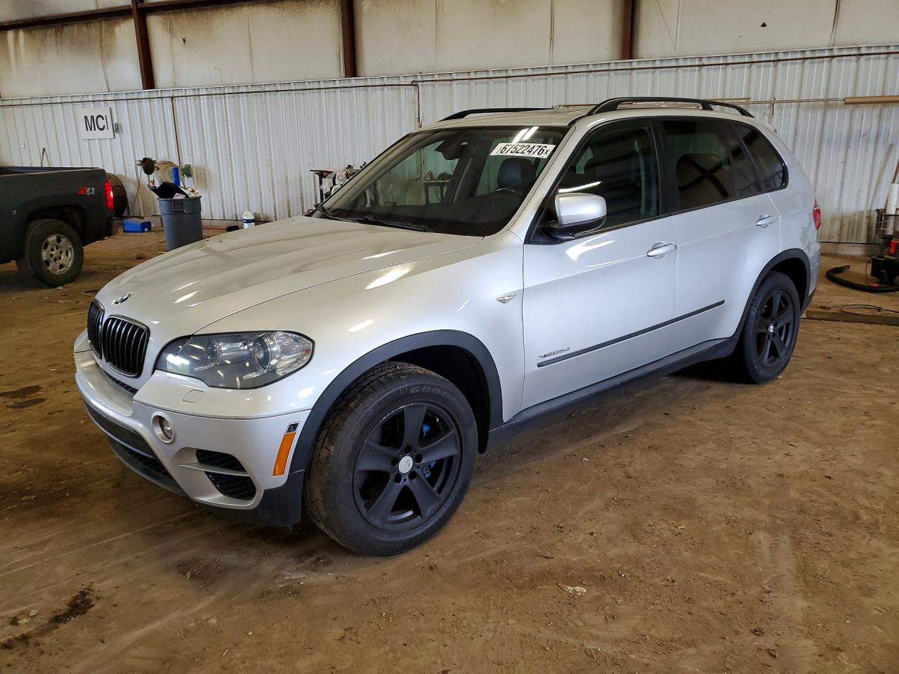 2012 BMW X5 xDrive35d — Front 3/4