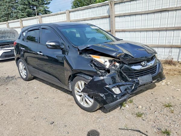 2013 HYUNDAI TUCSON — Passenger 3/4