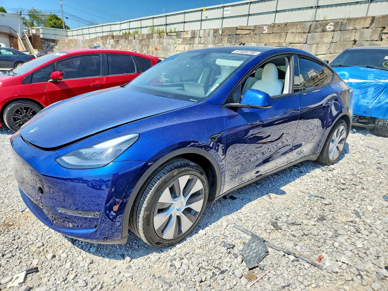 2024 TESLA MODEL Y — Front 3/4