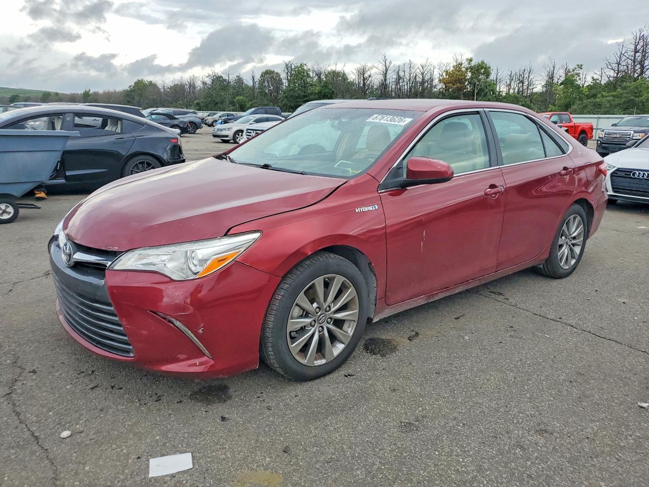 2016 TOYOTA CAMRY SOLA Hybrid — Front 3/4