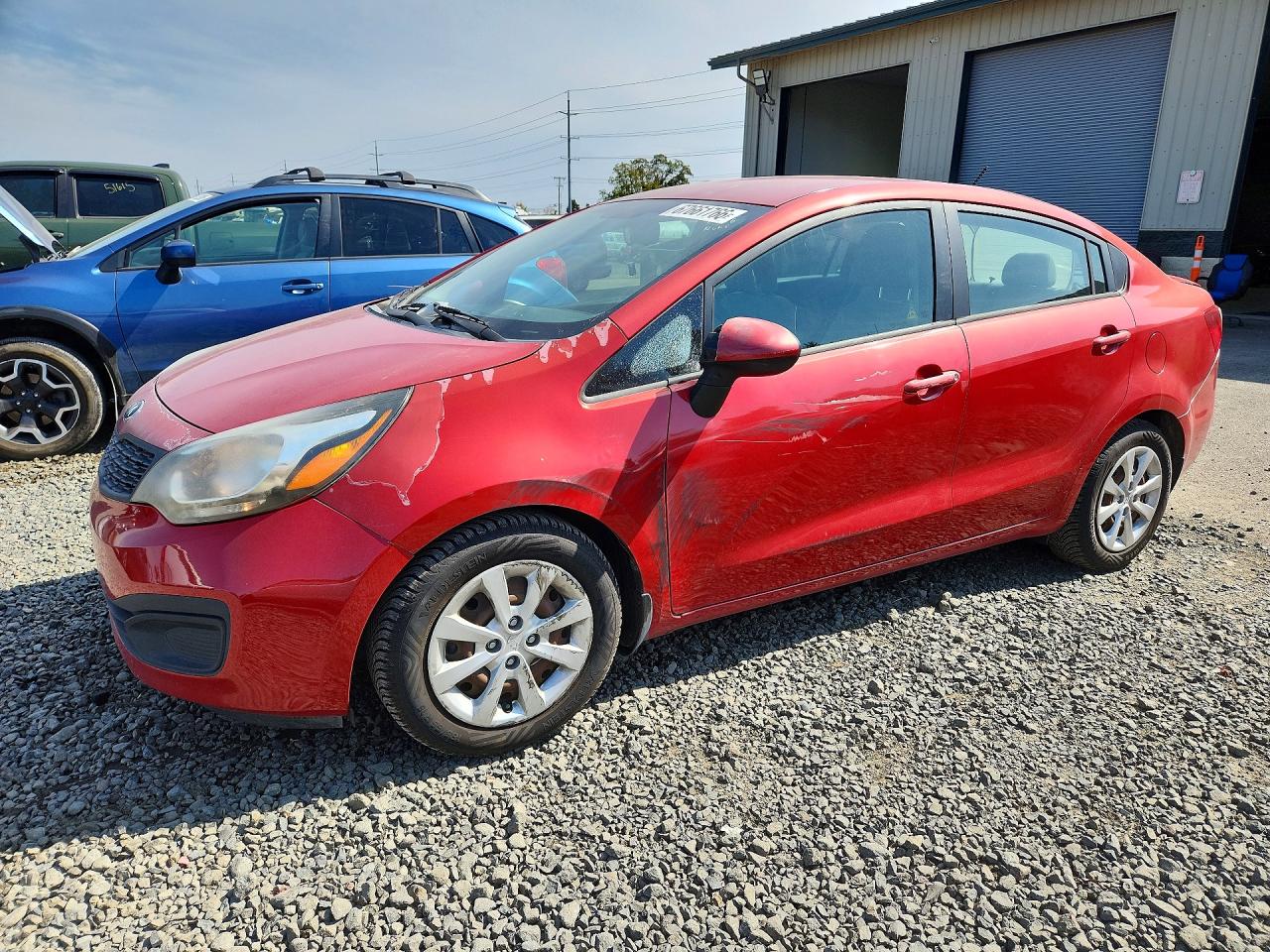 2014 KIA RIO 1.6 AT LX STD/Power — Front 3/4