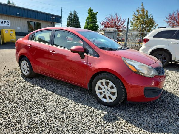 2014 KIA RIO 1.6 AT LX STD/Power — Passenger 3/4