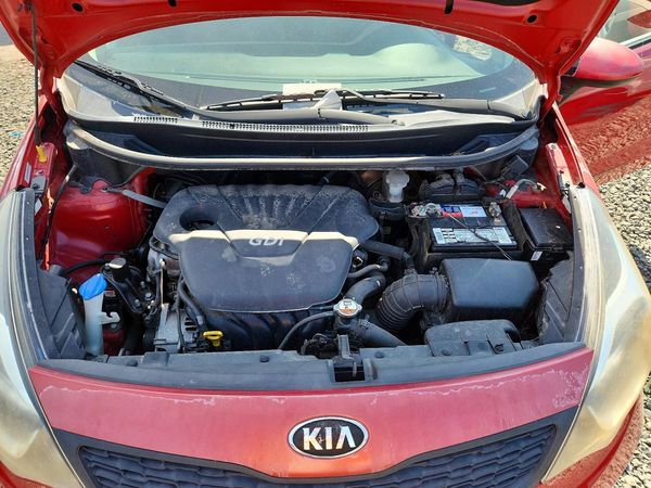 2014 KIA RIO 1.6 AT LX STD/Power — Engine bay