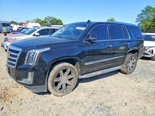 2016 CADILLAC ESCALADE Luxury — Front 3/4