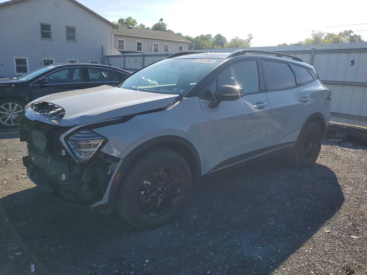 2023 KIA SPORTAGE X-PRO, X-PRO PRESTIGE — Front 3/4