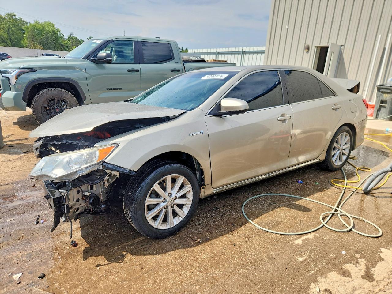 2014 TOYOTA CAMRY SOLA Hybrid — Front 3/4