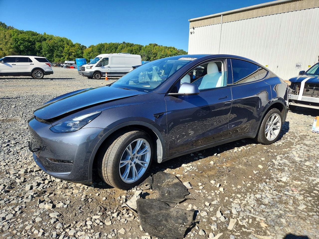 2023 TESLA MODEL Y — Front 3/4