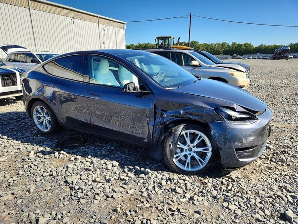 2023 TESLA MODEL Y — Passenger 3/4