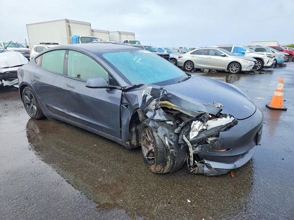2023 TESLA MODEL 3 — Passenger 3/4
