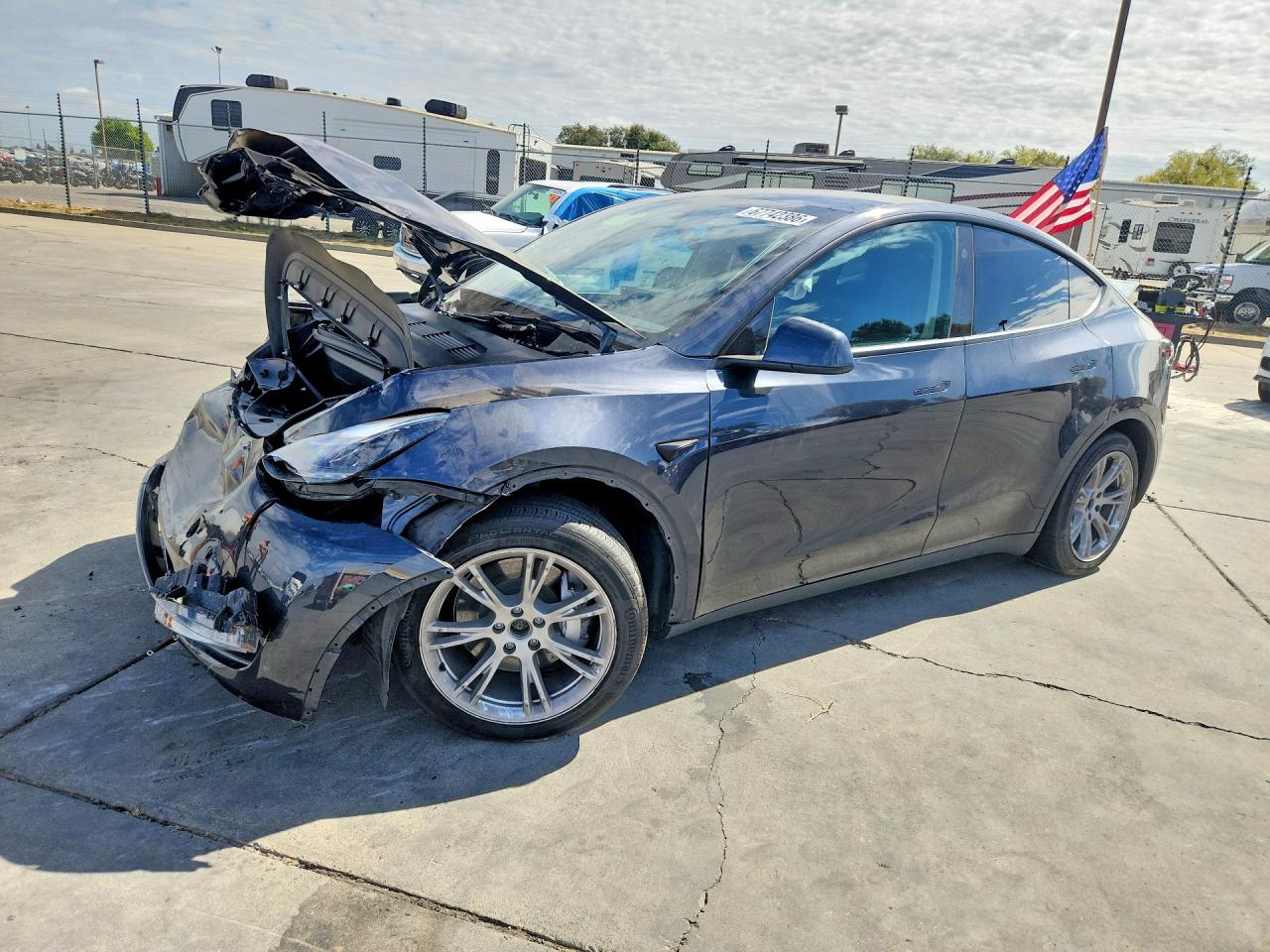2024 TESLA MODEL Y — Front 3/4