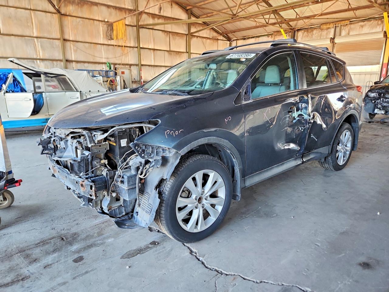 2013 TOYOTA RAV4 High — Front 3/4
