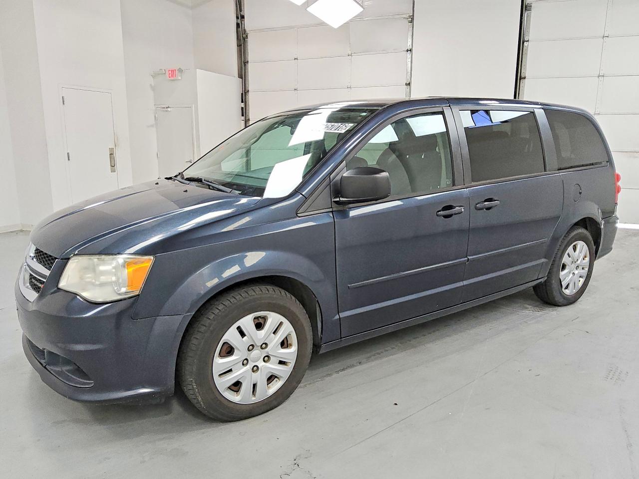 2014 DODGE GRAND CARAVAN SE — Front 3/4