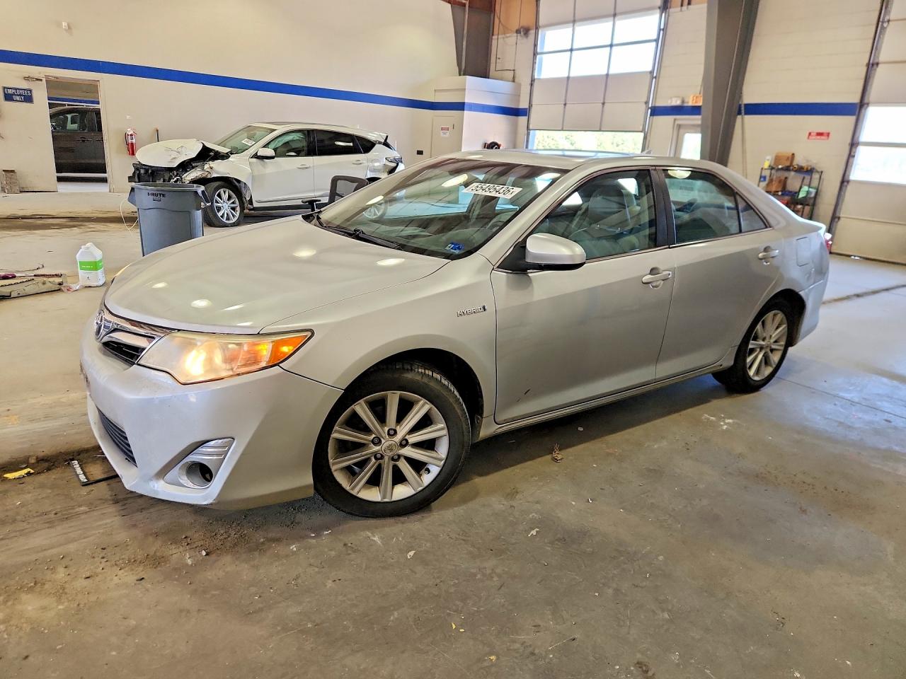 2012 TOYOTA CAMRY SOLA Hybrid — Front 3/4