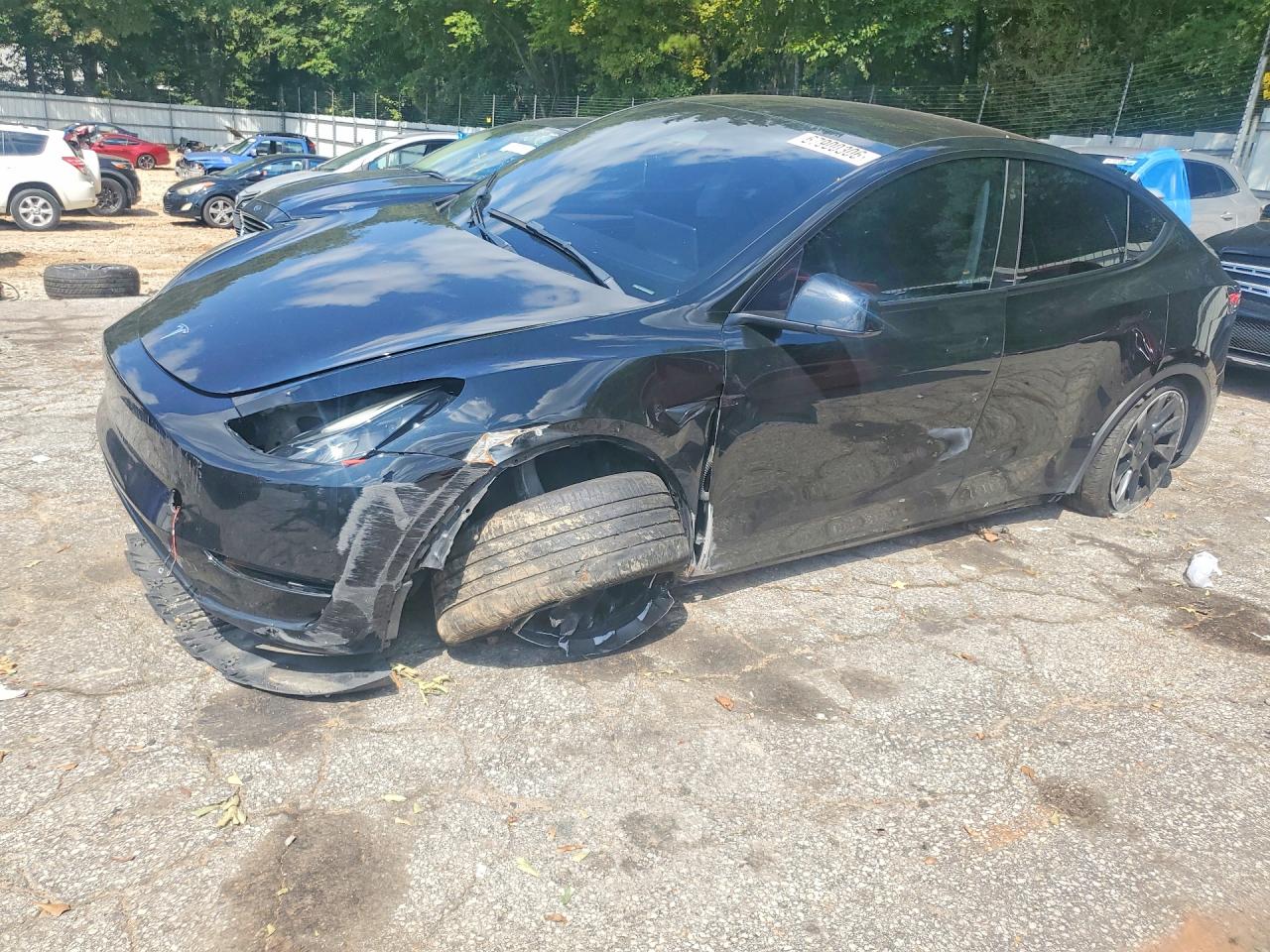 2023 TESLA MODEL Y — Front 3/4