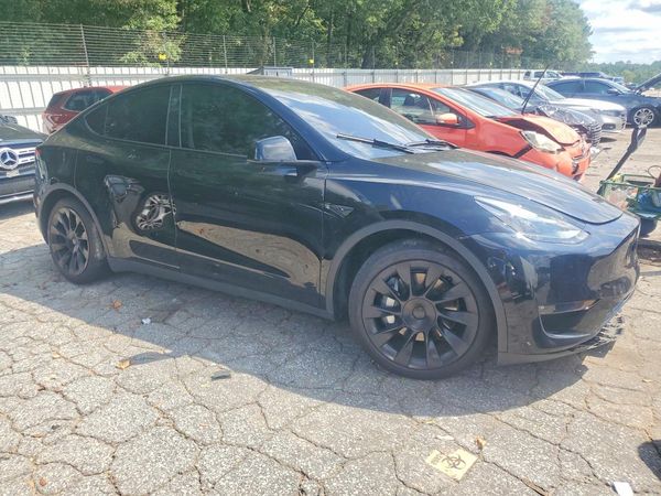 2023 TESLA MODEL Y — Passenger 3/4