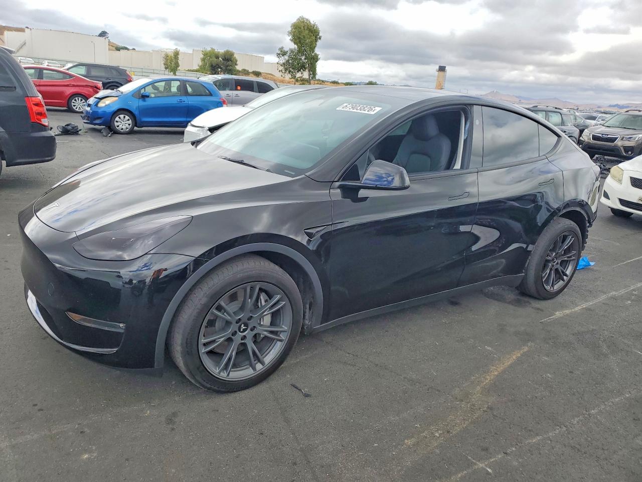 2024 TESLA MODEL Y — Front 3/4