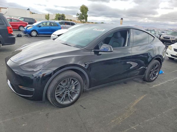 2024 TESLA MODEL Y — Front 3/4