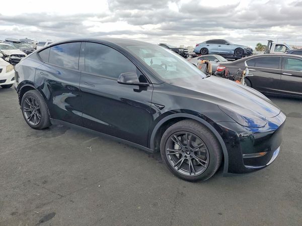 2024 TESLA MODEL Y — Passenger 3/4