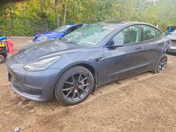 2022 TESLA MODEL 3 — Front 3/4