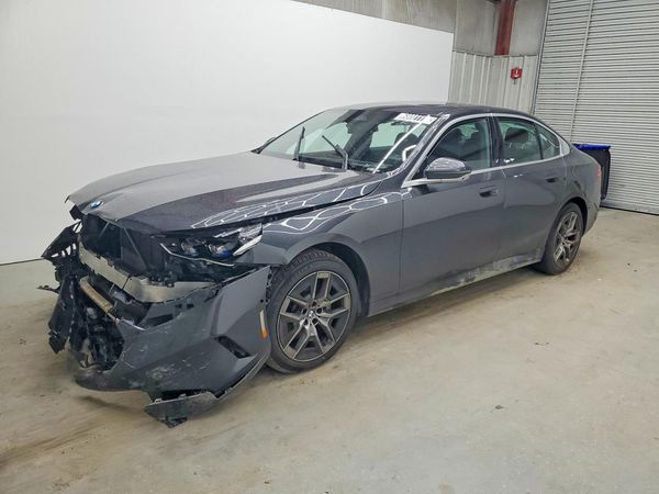 2026 BMW 5 SERIES xDrive — Front 3/4