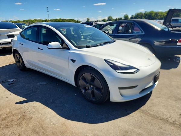 2023 TESLA MODEL 3 — Passenger 3/4