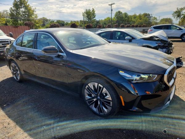 2026 BMW 530 xDrive — Passenger 3/4