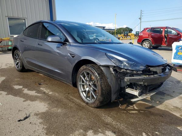 2023 TESLA MODEL 3 — Passenger 3/4