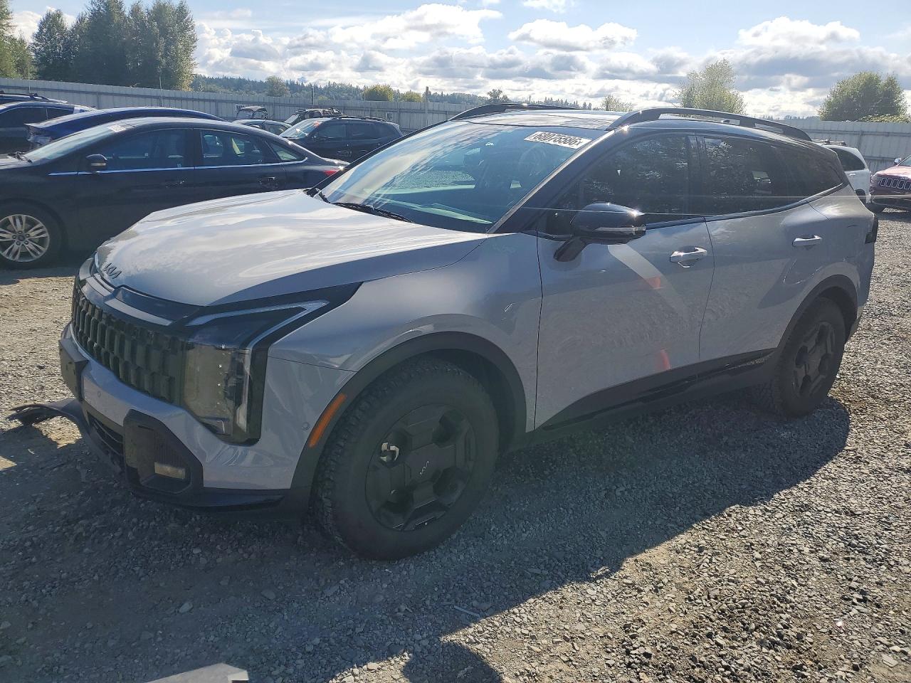 2026 KIA SPORTAGE X-PRO PRESTIGE — Front 3/4