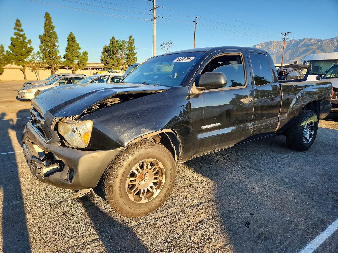 2013 TOYOTA TACOMA Delux — Front 3/4