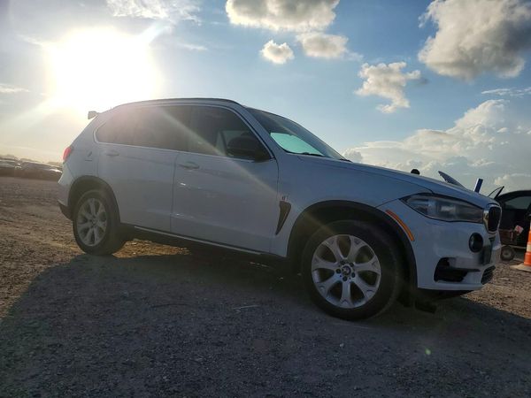 2014 BMW X5 xDrive35i — Passenger 3/4