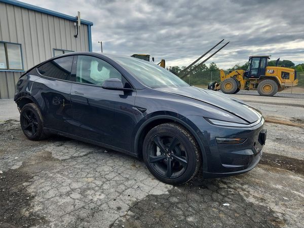 2026 TESLA MODEL Y — Passenger 3/4
