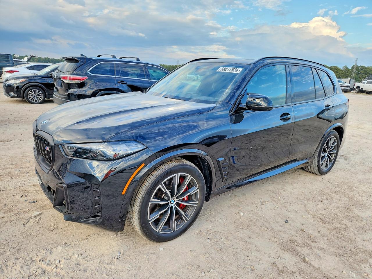 2026 BMW X5 M60i — Front 3/4